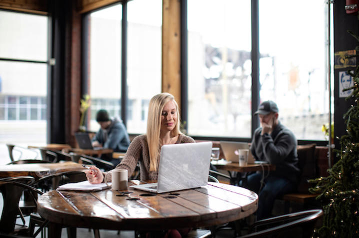 Photo of employee working in coffee shop