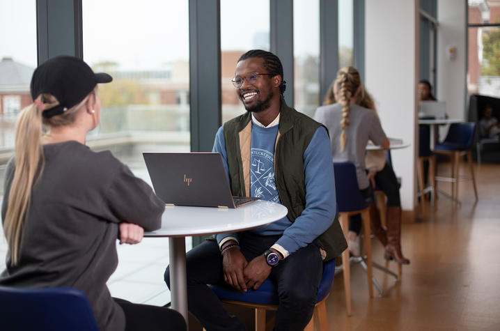 This is a photo of students inside the new UK College of Law building. 