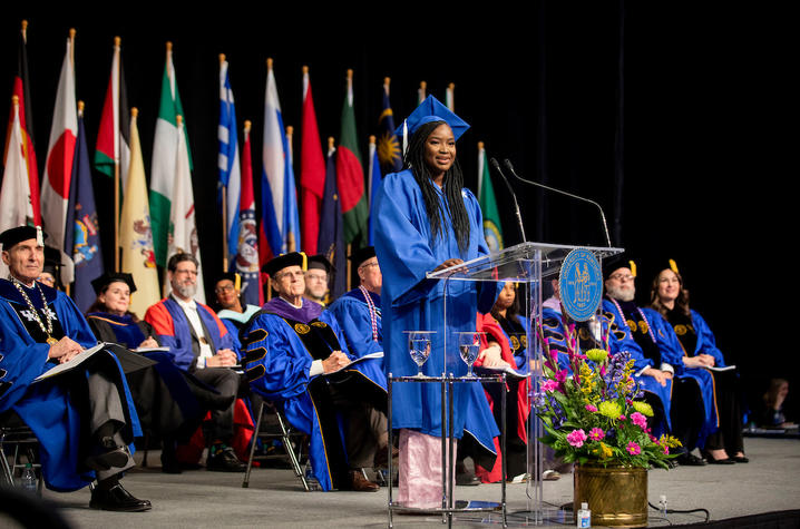 Photo of student speaker at December commencement