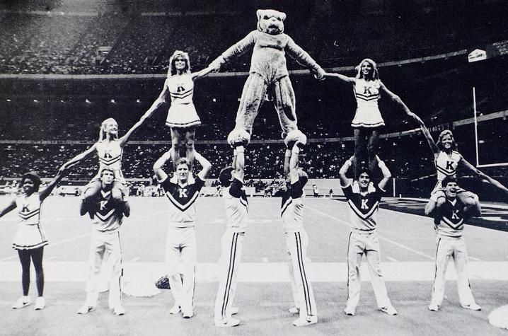 black and white photo of UK Cheerleaders in pyramid from 1985 Kentuckian