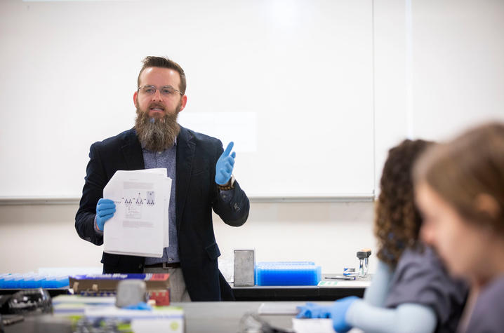 Lou Hirsch instructs students in a classroom