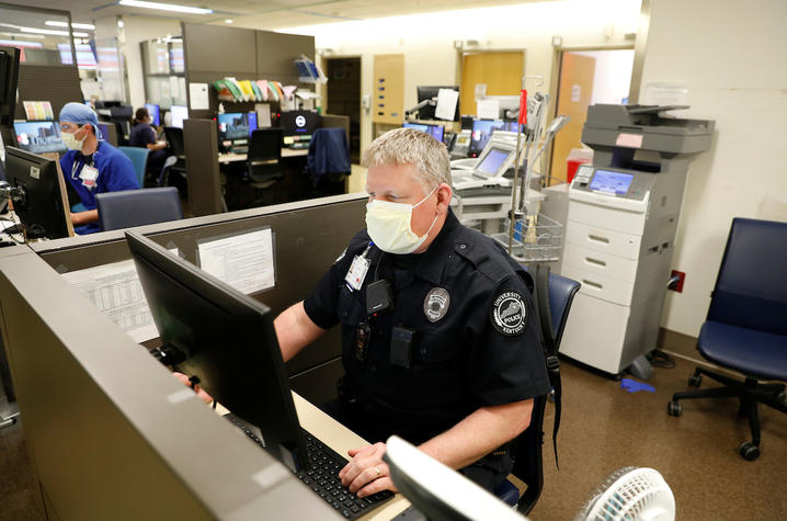 Photo of UKPD security office working in health care setting