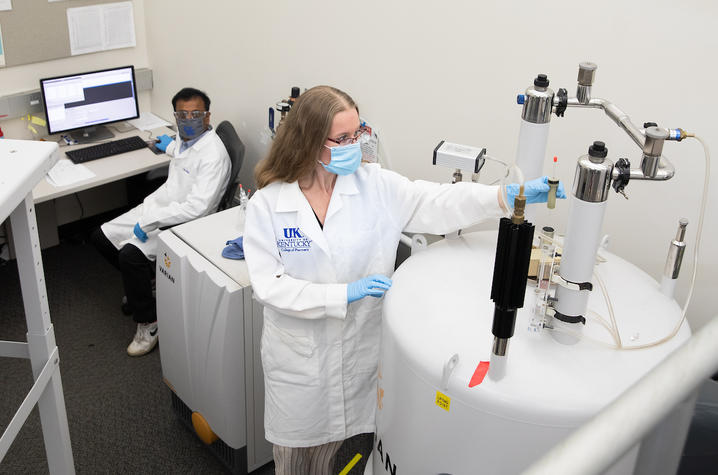 Sylvie Garneau-Tsodikova and Vivek Subramanian in the UK PharmNMR Center.