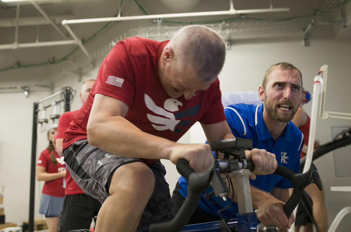 An 'Eagle Athlete' works alongside Dr. Nick Heebner in the UK Sports Medicine Research Institute facility