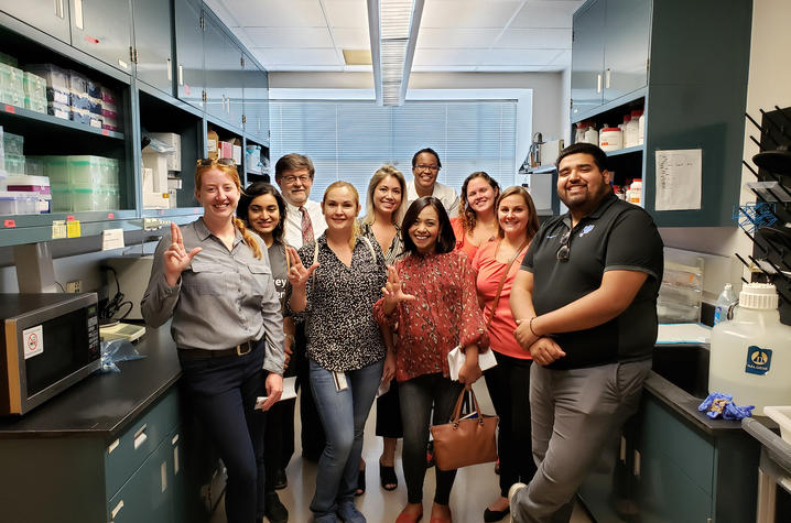 photo of trainees in UK Professor Kevin Pearson's lab