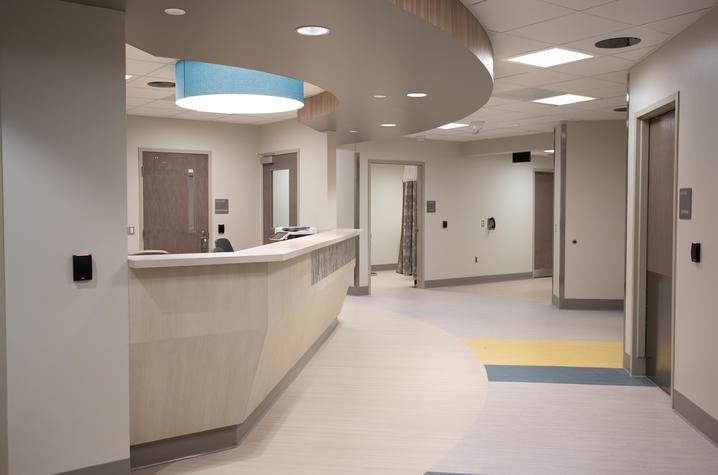 image of nurse's station with gray walls and colorful inlay floor