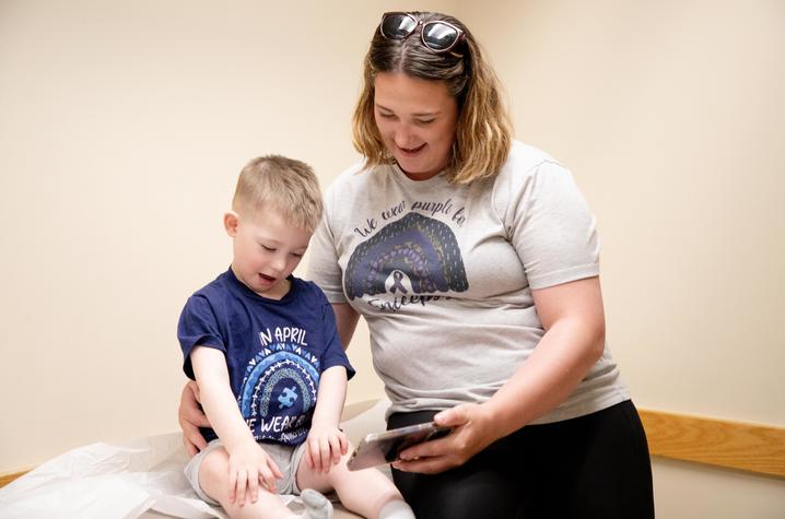 Image of Easton with his mother Tabbitha in the clinic.