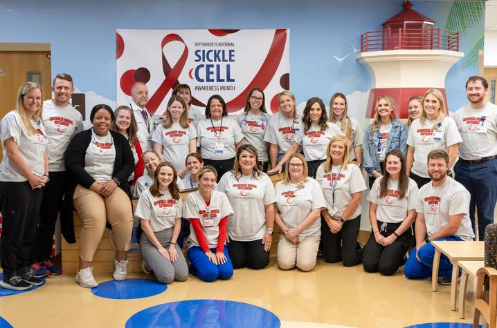Image of DanceBlue Kentucky Children’s Hospital Hematology/Oncology Clinic team wearing matching shirts