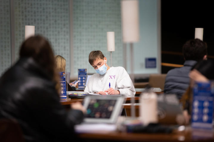 Male student studying. 