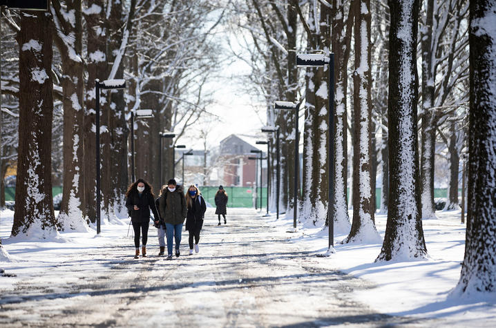 Photo of students walking in the snow
