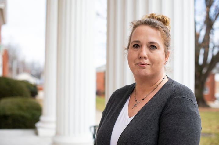 Communications coordinator Rebecca Hurst photographed outside Mandrell Hall, where UK Health Corps is based