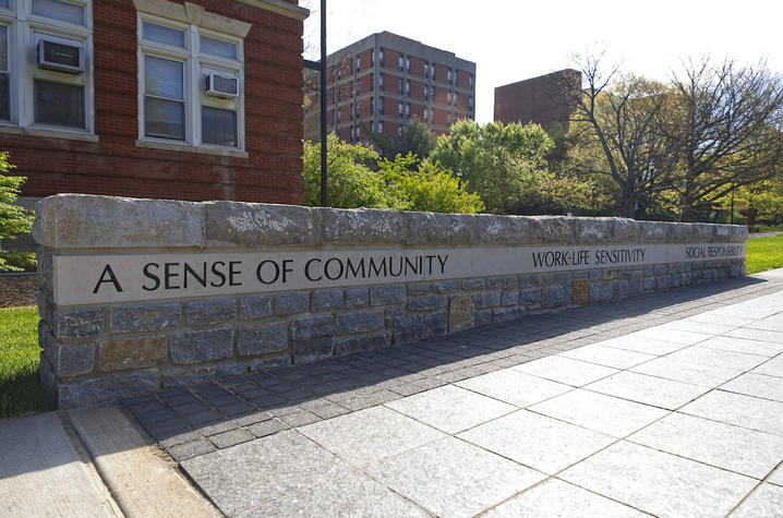 Wall in plaza in front of Memorial Hall with "A Sense of Community" etched into it