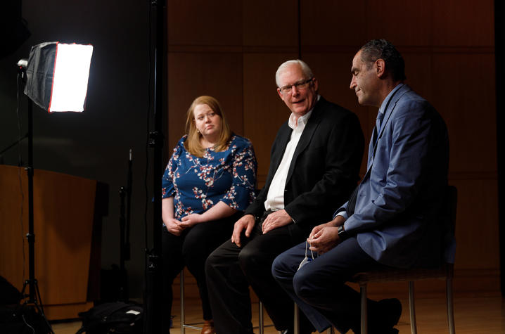 Allison Gibson, left, College of Social Work, left, Dr. Greg Jicha of Sanders-Brown , center, and Dr. Peter Sawaya, nephrology, on the set of some training videos they will be producing on April 23, 2021. Photo by Mark Cornelison | UKphoto