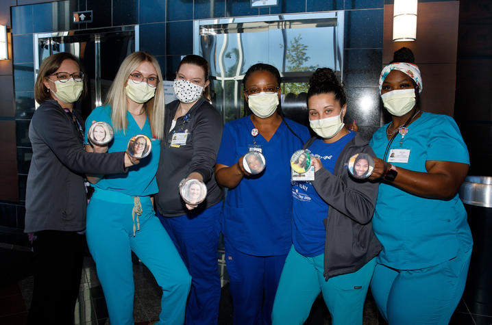 Barnstable Brown Diabetes Clinic uses picture pins so the children know what their caretaker looks like behind the masks. L-R Angela Hepner, Brooke Combs, Shannon O'Mara, Shana Atanga, Brianna Romano, Keila Guy. Photo by Mark Cornelison | UKphoto