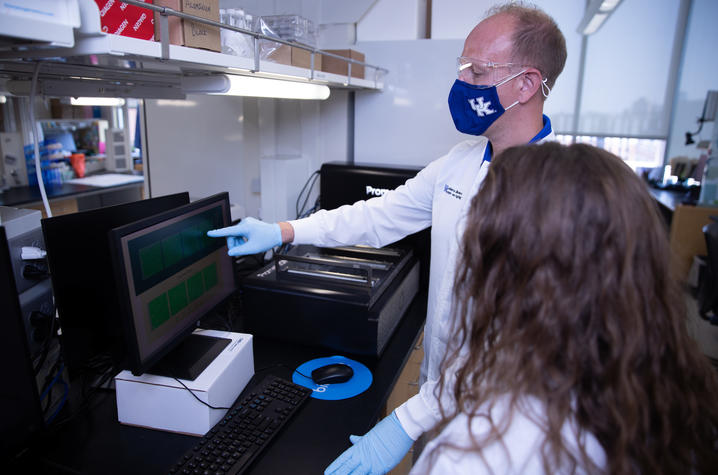 Mark Ebbert and his research assistant on August 5, 2021. Photo by Pete Comparoni | UKphoto