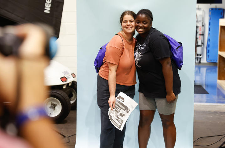 Students pose for a photo at the Ky. Kernel booth during Campus Ruckus on August 19, 2021. 