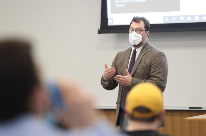 Zachary Bray teaching in classroom