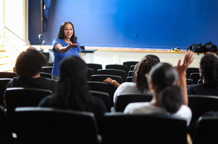 instructor in a classroom with students. 