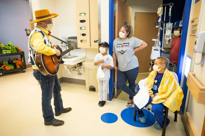 image of Dr. Day singing to a patients