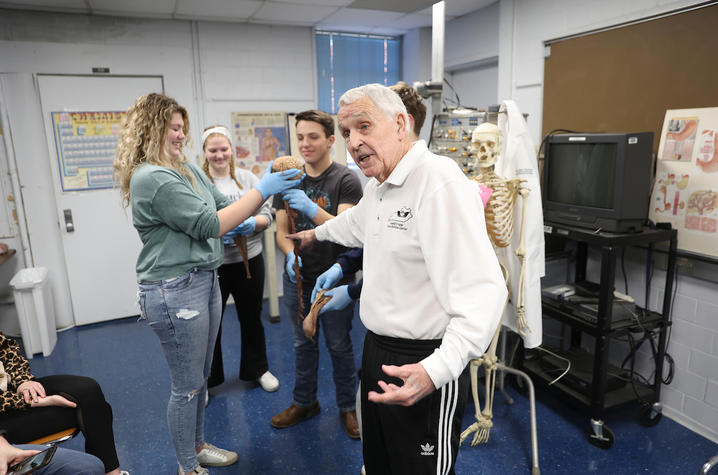 Don frazier showing students how organs work together