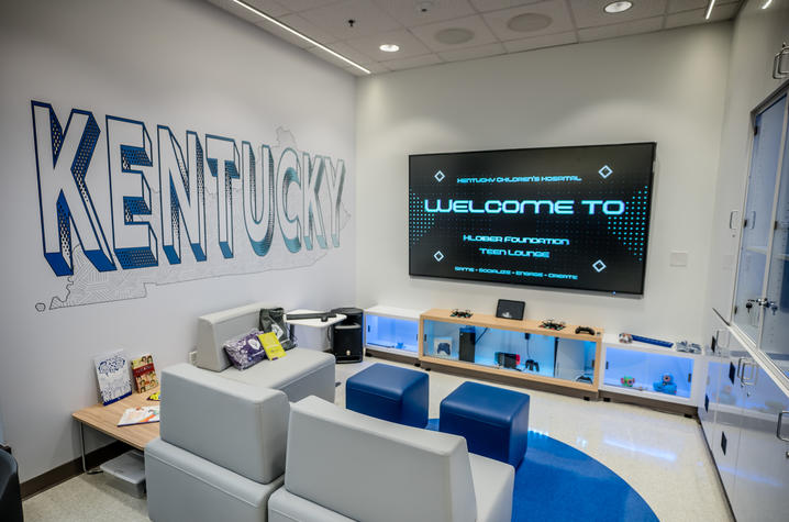 image of teen room in KCH with screen and gaming consoles