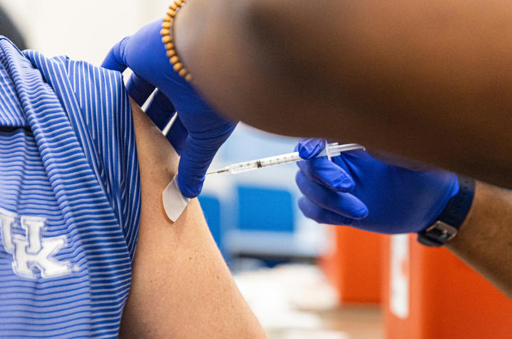 An individual receives a flu vaccine. 