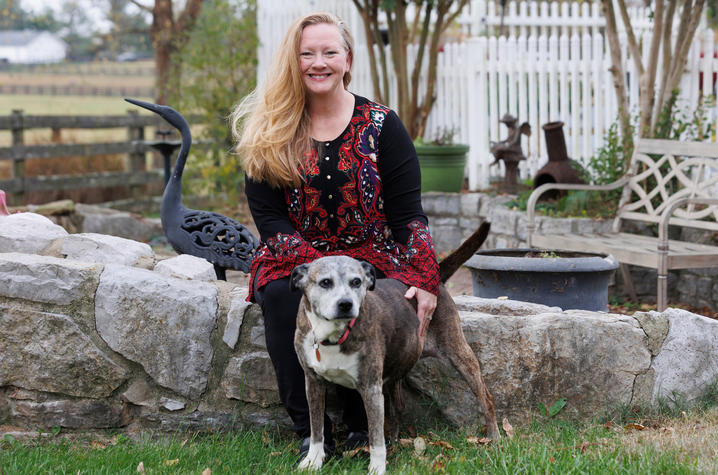 Before receiving an accurate diagnosis and treatment plan, Tina Frazier was unable to do many things she loves like working in her yard and playing with her dog "Pepper". Mark Cornelison | UK Photo