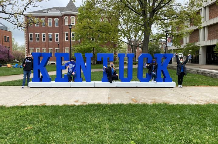 photo of people with the Kentucky letters