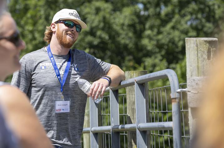 Brock Vandagriff listens to a presentation