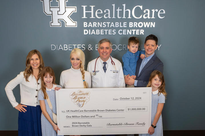 The Barnstable Brown family present the 2024 Gala's $1 million donation to Dr. Simon Fisher, director of the Barnstable Brown Diabetes Center. Photo by Mark Mahan.