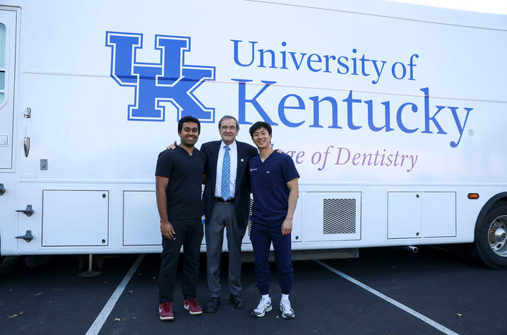 UK Dentistry Dean, Jeffrey Okeson with two current dental students. Carter Skaggs | UKPhoto