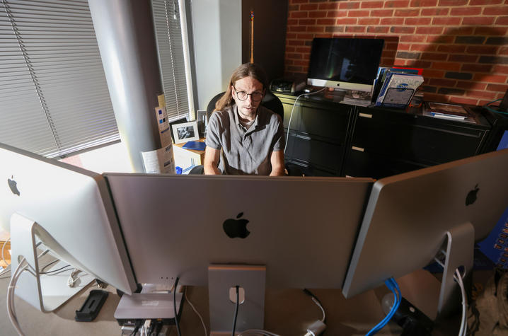 Brent Harrison, professor in College of Engineering works on his computer. Photo by    Mark Cornelison | UK Photo 