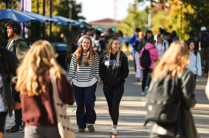 Students walking on campus. 