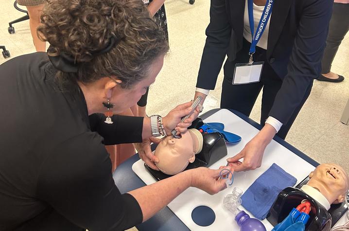 Image of providers engaging in a medical simulation