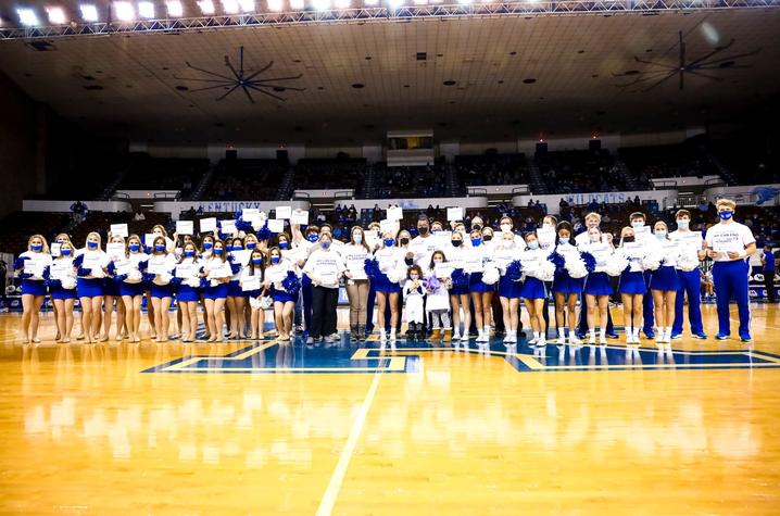 Members of Sanders-Brown were recognized at half court during the UK Women's Basketball game dedicated to Alzheimer's research. Photo by | UK Athletics