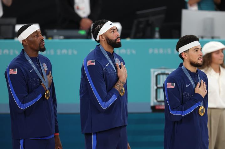 Bam Adebayo, Anthony Davis and Devin Booker (left to right) brought home Team USA Basketball’s fifth-consecutive gold medal. Photo by Getty Images.