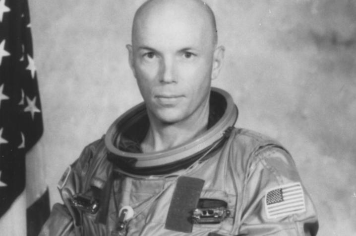 black and white astronaut Story Musgrave in flight suit