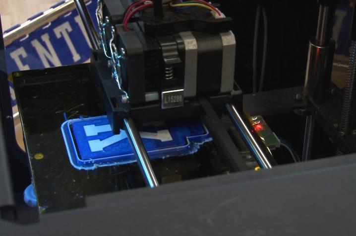 photo of K tile being printed on a 3D pringer