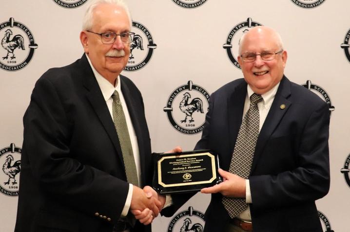 Anthony “Tony” Pescatore receiving award