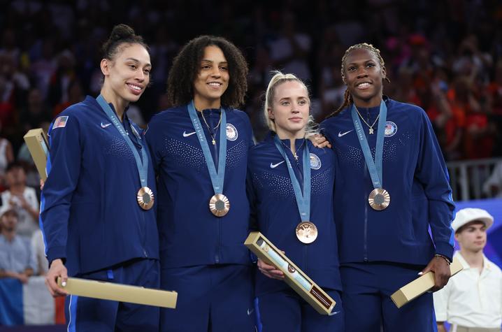 In Women’s 3x3 Basketball, Rhyne Howard (far right) and Team USA take home the bronze medal. Photo by Getty Images.