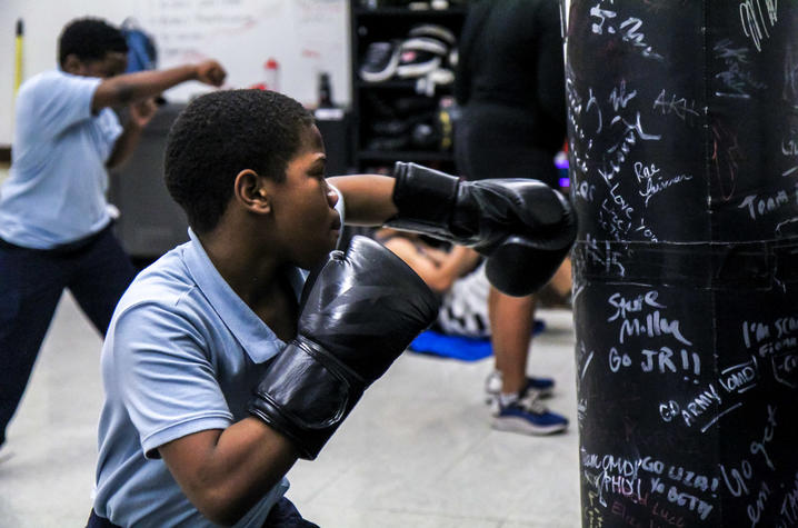 Photo of child boxing