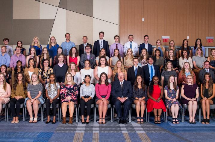photo of 2018-2019 scholarship recipients with Fritz Skeen, the president of the UK Alumni Association, center.