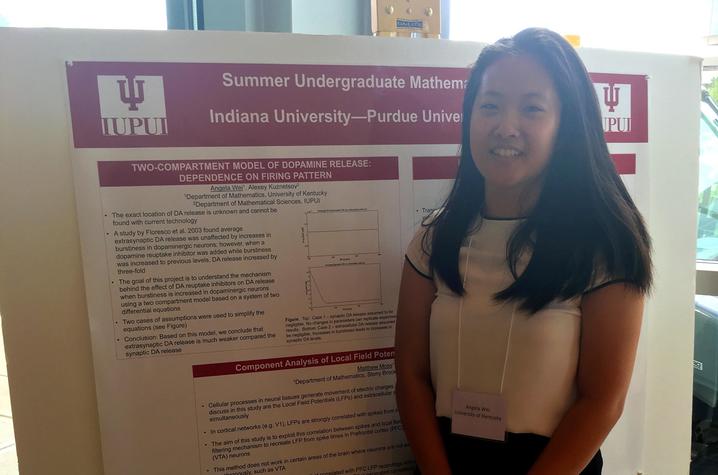 photo of Angela Wei presenting research as part of NSF-REU at IU