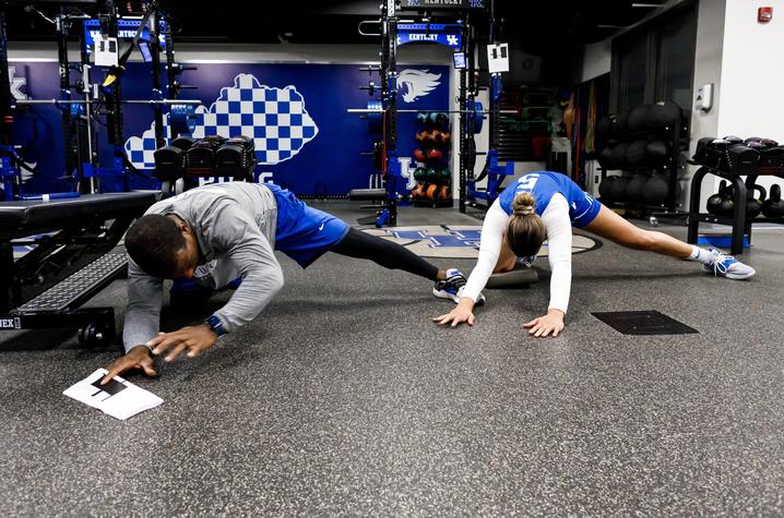 blair green stretching with an athletic trainer