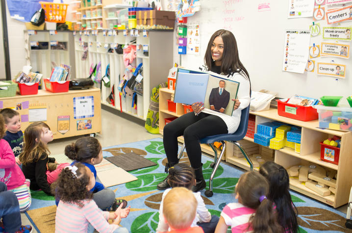 Photo of Miranda Fulce reading at Breckinridge Elementary.