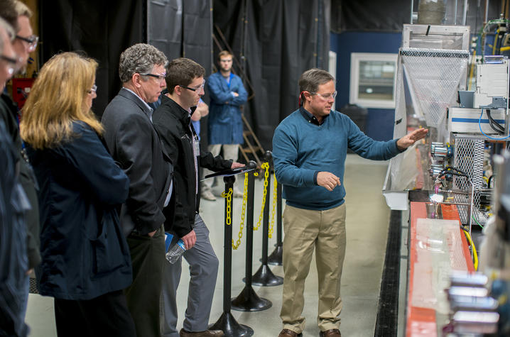 photo of Matt Weisenberger, associate director of UK CAER’s Carbon Materials Technologies Group, showcases the center’s unique carbon fiber spinning capabilities.