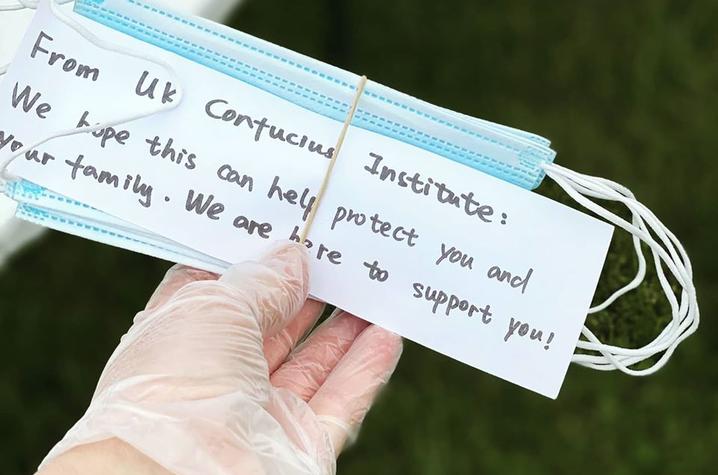 photo of mask with message from Confucius Institute