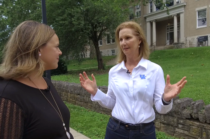 This is a photo taken from the Campus Walk with Dean Donna Arnett