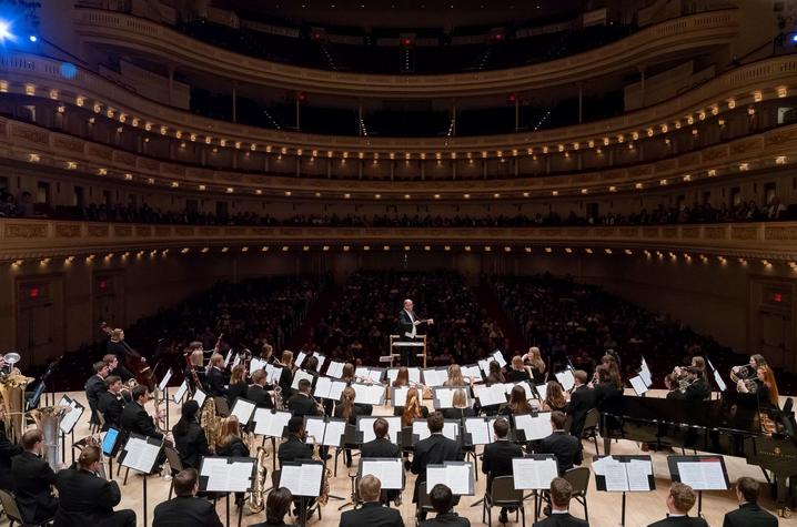 photo of Cody Birdwell conducting the UK Wind Symphony at Carnegie Hall in 2019