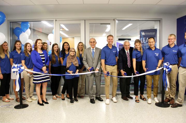 photo of President Capilouto and others cutting ribbon to open Center for Student Philanthropy